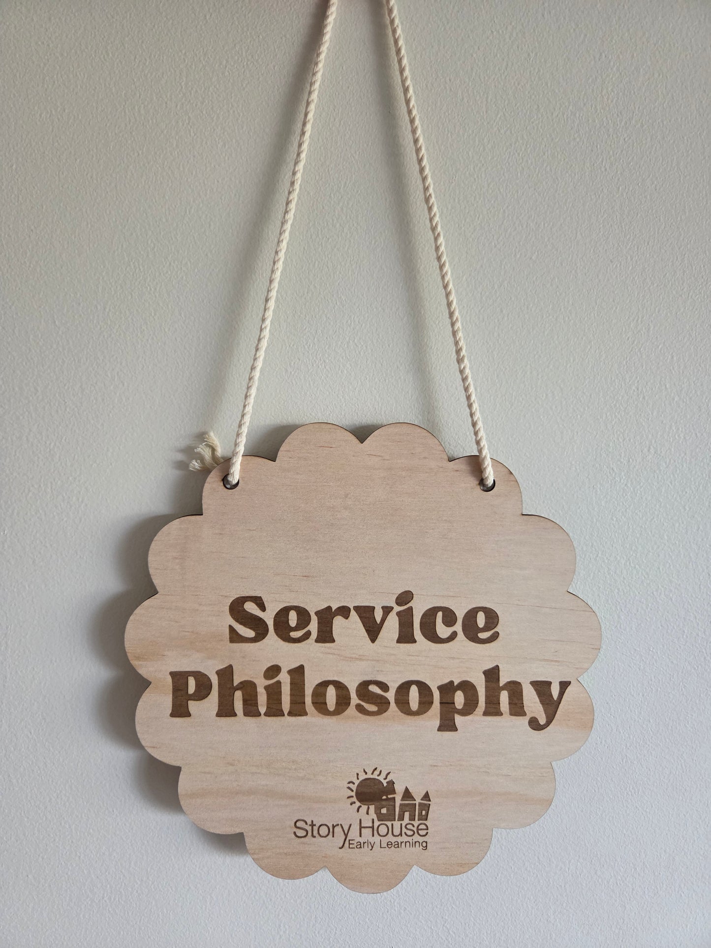 Scalloped Shaped Service Philosophy Hanging Sign